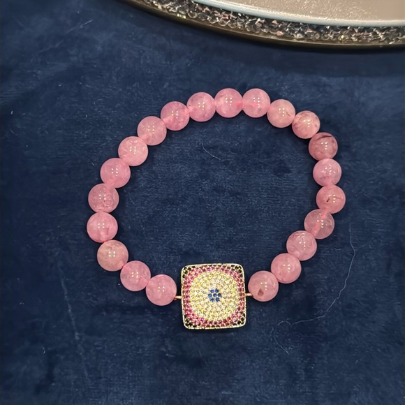 Jewelry - Pink  beads stretchable bracelet with evil eye charm good luck